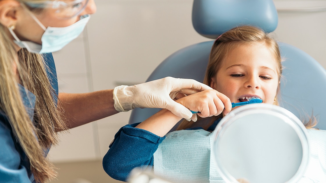 Child Receiving Instructions on Brushing